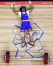 Thailand's Rattikan Gulnoi falls after failed attempt on the women's 58Kg Group A weightlifting competition at the London 2012 Olympic Games July 30, 2012.