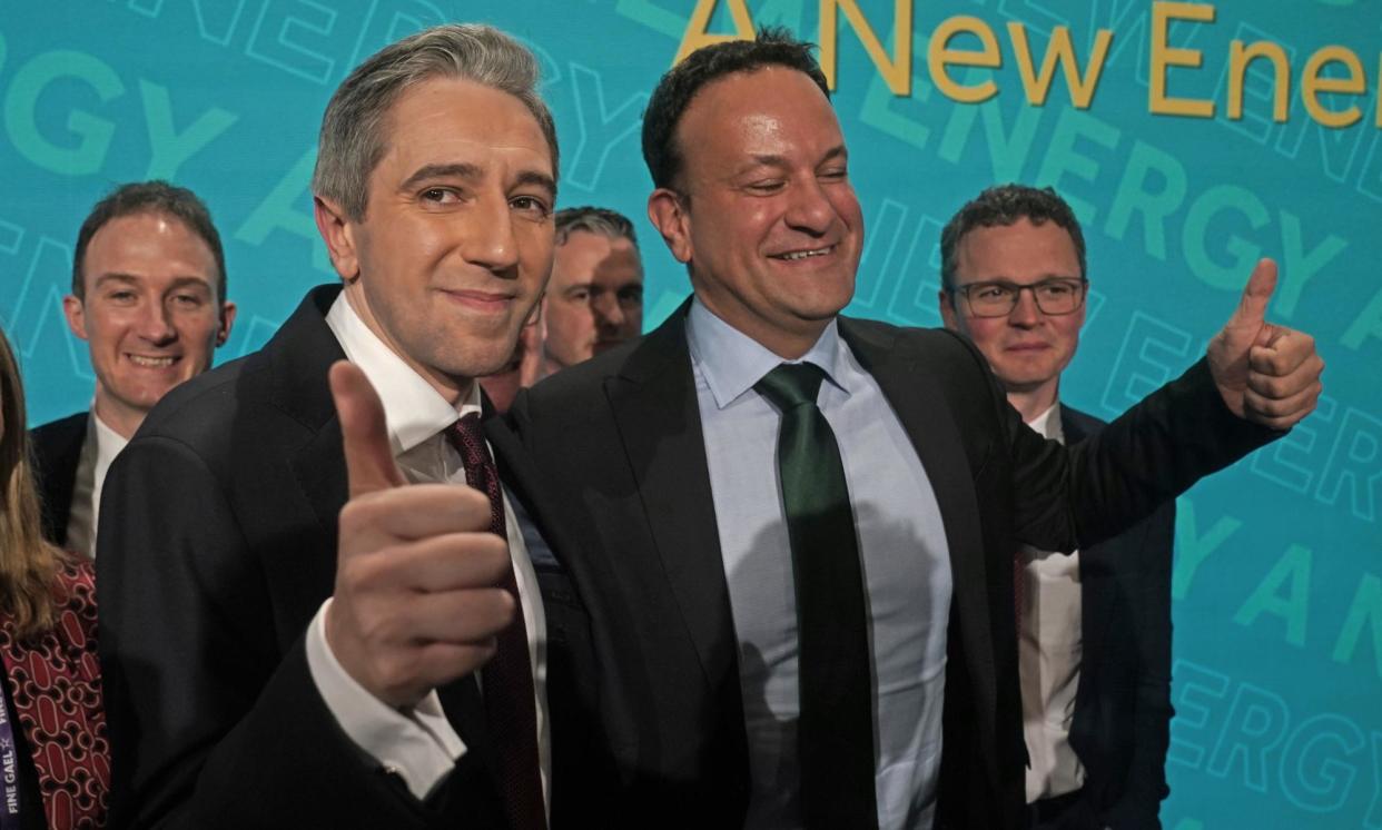 <span>Simon Harris (front left) and Leo Varadkar at the 82nd Fine Gael Ard Fheis, the party’s annual conference, at the University of Galway.</span><span>Photograph: Brian Lawless/PA Wire</span>