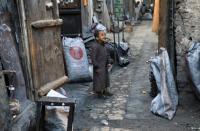 A Yemeni child plays in Sanaa's old city on November 13, 2018