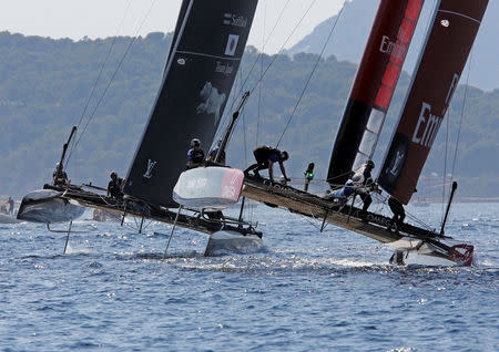 FILE PHOTO: France Sailing - Louis Vuitton America's Cup World series - Toulon, France - 11/09/2016 - (R to L) Emirates Team New Zealand and Softbank Team Japan in action. REUTERS/Jean-Paul Pelissier/File Photo