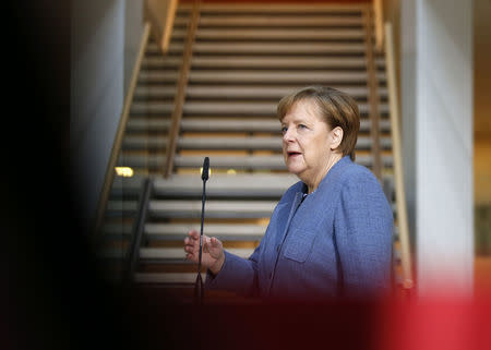 German Chancellor Angela Merkel of the Christian Democratic Union (CDU) arrives for coalition talks at the Social Democratic Party (SPD) headquarters in Berlin, Germany, February 4, 2018. REUTERS/Axel Schmidt
