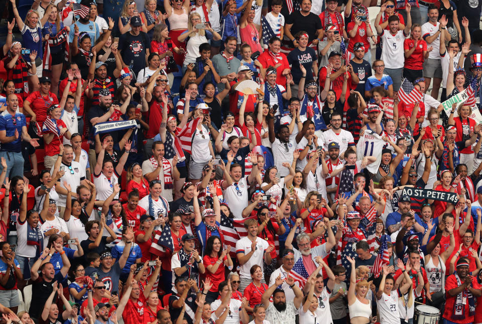 LYON, FRANCE - JULY 07:   USA fans celebrate following their sides victory in the 2019 FIFA Women's World Cup France Final match between The United States of America and The Netherlands at Stade de Lyon on July 07, 2019 in Lyon, France. (Photo by Marianna Massey - FIFA/FIFA via Getty Images)