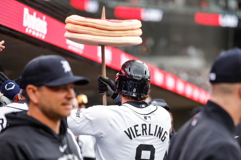 Detroit Tigers right fielder Matt Vierling (8) celebrates a solo home run against Oakland Athletics during the fourth inning of the home opening day at Comerica Park in Detroit on Friday, April 5, 2024.