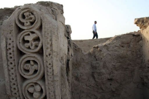 An Iraqi excavation official walks across the archaeological site of a pre-Islamic Christian monastery in the central city of Najaf on April 23, 2012. Foreign exploration teams have largely avoided Iraq entirely over security fears, even though levels of violence in the country are significantly lower than their peak in 2006 and 2007