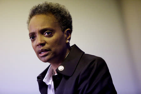 FILE PHOTO: Chicago mayoral election candidate Lori Lightfoot (L) speaks during a news conference after attending a recorded forum in Chicago, Illinois, U.S. March 26, 2019. REUTERS/Joshua Lott/File Photo