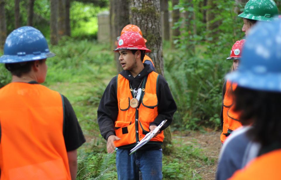 John Perales, rising senior at Sheldon High School, presents to his peers as part of the five-day Summer Forestry Immersion program, which was put on by Eugene School District 4J and local nonprofit Forests Today and Forever at the Bauman Tree Farm on June 27.