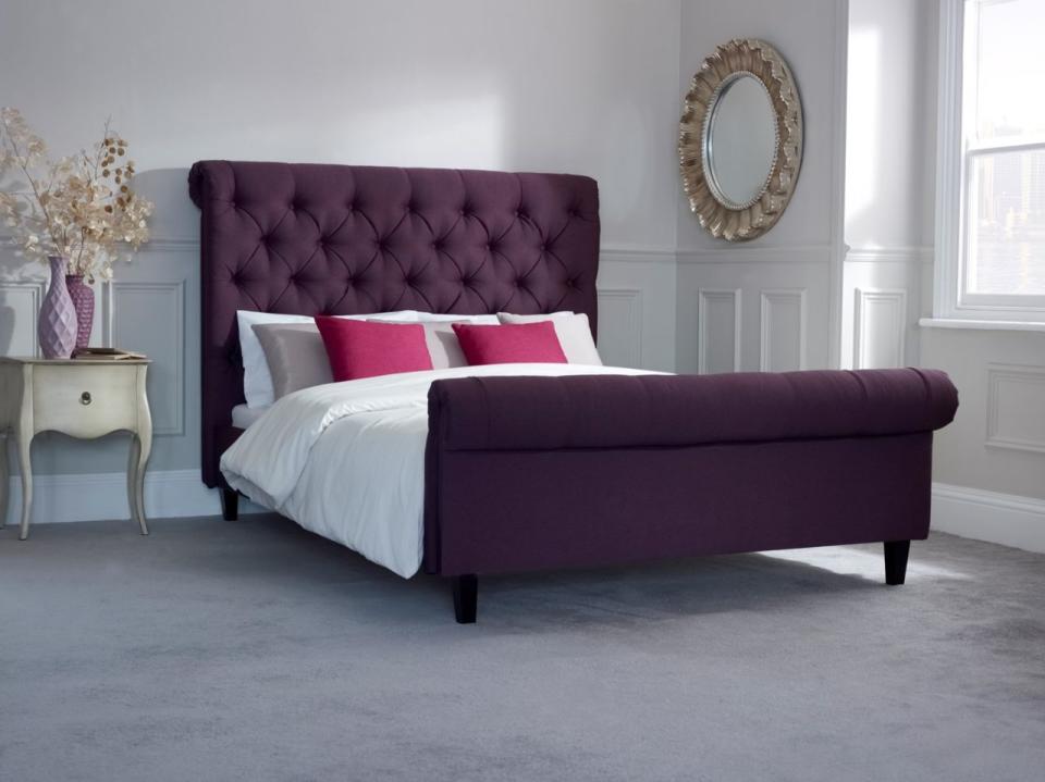 <p>Update your bedroom with this deep purple bed that showcases a traditional look with a rolled button headboard. It will add a sense of comfort and luxury to your boudoir interiors. </p><p><strong>BUY NOW:</strong> <a rel="nofollow noopener" href="http://www.livingitup.co.uk/evie-bed.html" target="_blank" data-ylk="slk:Purple Evie Bed, £890, Living It Up;elm:context_link;itc:0;sec:content-canvas" class="link ">Purple Evie Bed, £890, Living It Up</a></p>