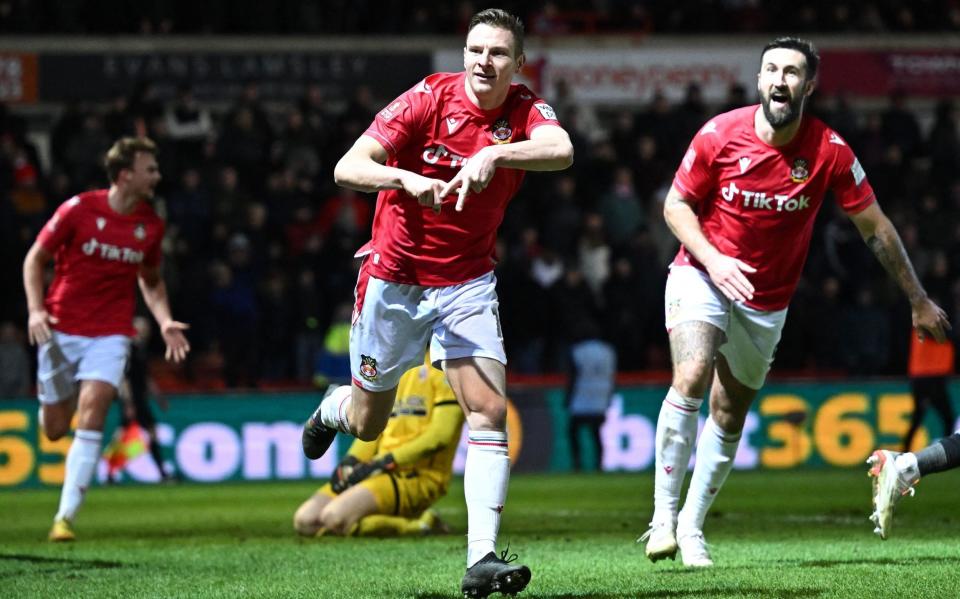 Hero of the day Paul Mullin put Wrexham in the fifth round before Egan's equaliser booked both teams another meeting - AFP/Oli Scarff