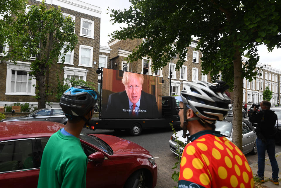 A video by political campaign group Led By Donkeys of the statement made by Prime Minister Boris Johnson is shown outside the north London home of his senior aide Dominic Cummings , as lockdown questions continue to bombard the Government after it emerged that he travelled to his parents' home despite coronavirus-related restrictions. (Photo by Victoria Jones/PA Images via Getty Images)