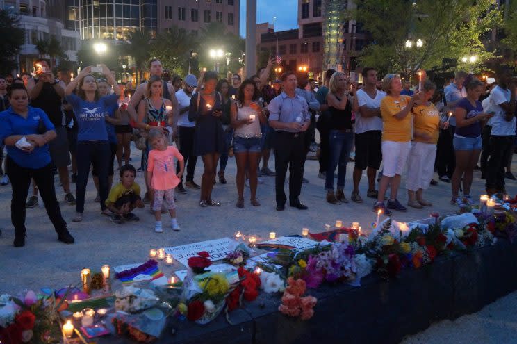 A candlelight vigil was held on June 13, 2016, outside the Dr. Phillips Center for the Performing Arts in downtown Orlando for victims of the Pulse shooting. (Photo: Michael Walsh/Yahoo News)