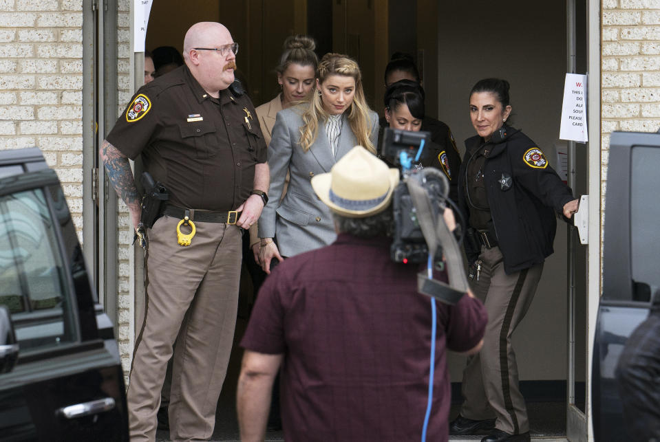 Actress Amber Heard departs the Fairfax County Courthouse Friday, May 27, 2022 in Fairfax, Va. A jury heard closing arguments in Johnny Depp's high-profile libel lawsuit against ex-wife Amber Heard. Lawyers for Johnny Depp and Amber Heard made their closing arguments to a Virginia jury in Depp's civil suit against his ex-wife.(AP Photo/Craig Hudson)