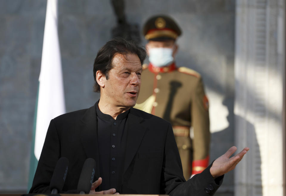 Pakistan Prime Minister Imran Khan speaks during a joint news conference with Afghan President Ashraf Ghani at the Presidential Palace in Kabul, Afghanistan, Thursday, Nov. 19, 2020. Ghani on Thursday met with Khan in the capital Kabul to discuss Afghan peace talks, to build trust and strengthen relations between both Afghanistan and Pakistan. (AP Photo/Rahmat Gul)