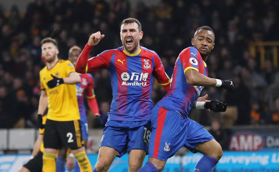 Jordan Ayew celebrates his first goal of the season and James McArthur can’t believe it