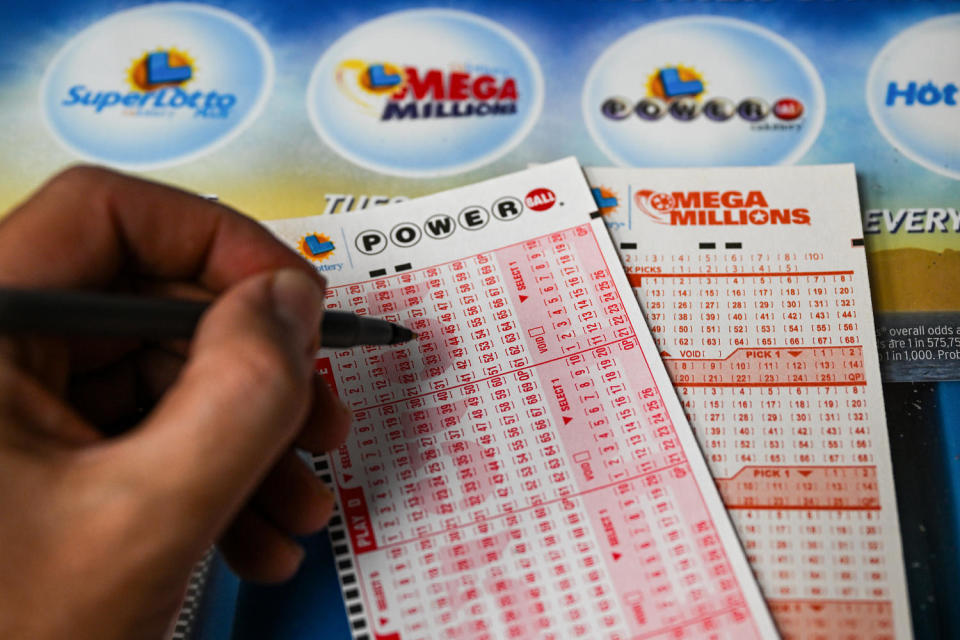 A Powerball lottery ticket is filled out (Tayfun Coskun / Anadolu Agency via Getty Images file)