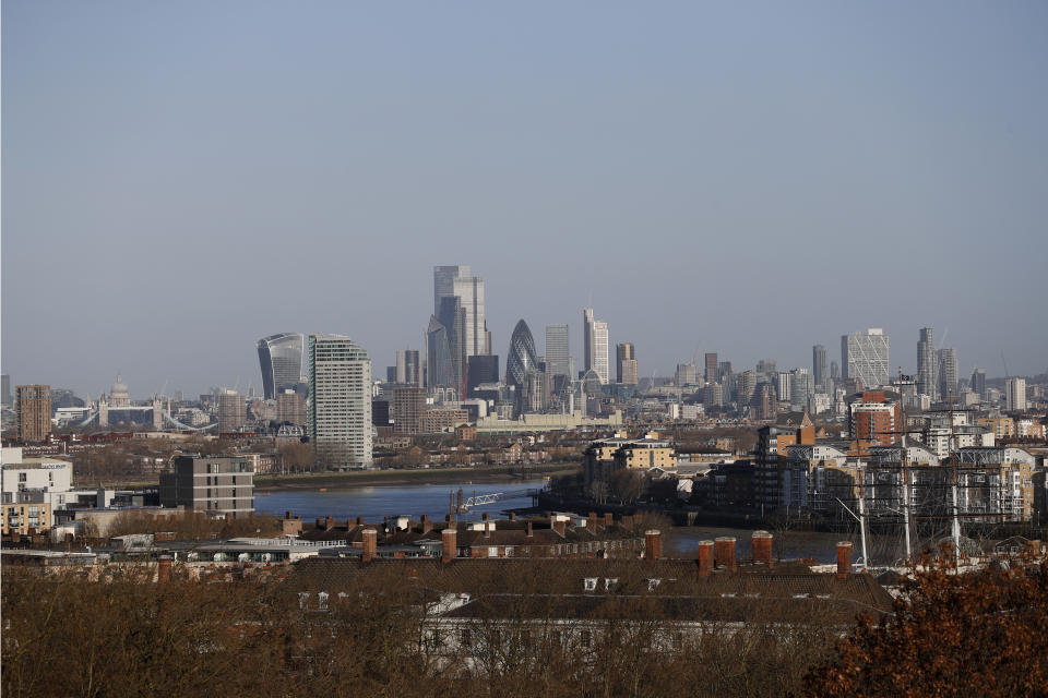 A general view over London from the Greenwich Observatory, with Tower Bridge and St Pauls Cathedral, left, and the City, of London, Saturday, March 27, 2021. Brexit and the coronavirus pandemic have hit London in a perfect storm. On May 6, Londoners will elect a mayor, whose performance will help determine whether this is the start of a period of decline for Europe's biggest city — or a chance to do things better. Current Mayor Sadiq Khan, who is favored to win re-election, says his top priority is preserving jobs threatened by the economic blow of the pandemic. Rival Shaun Bailey says his top priority is crime. Whoever wins will face the challenge of leading London's fightback from its biggest shock for generations. (AP Photo/Alastair Grant)