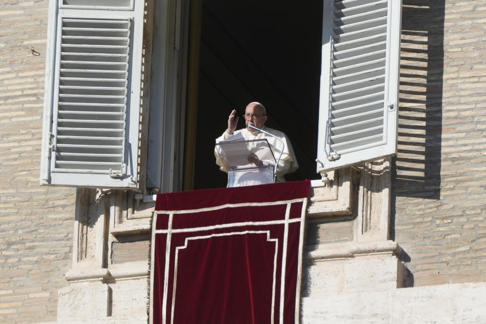 Pope Francis delivers the Angelus noon prayer in St. Peter's Square at the Vatican, Sunday, Dec. 12, 2021. (AP Photo/Gregorio Borgia)