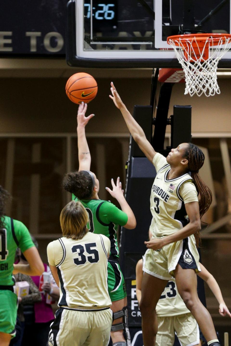 Purdue guard Jayla Smith (3) goes up to block against Marshall forward Aarionna Redman (30) during the second quarter of an NCAA women's basketball game, Monday, Nov. 22, 2021 at Mackey Arena in West Lafayette.