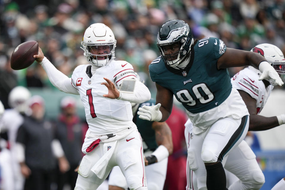 Arizona Cardinals quarterback Kyler Murray (1) throws a pass as Philadelphia Eagles defensive tackle Jordan Davis (90) tries to get to him during the first half of an NFL football game, Sunday, Dec. 31, 2023, in Philadelphia. (AP Photo/Matt Slocum)