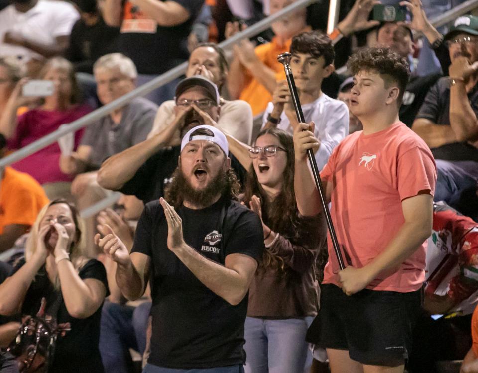 Hawthorne fans cheer the team during second half action on  Friday, Nov. 25, 2022, at Hawthorne High School in Hawthorne, Fla. during the 2022 FHSAA Football State Championships play off.  Hawthorne held on to win 21-20.  [Alan Youngblood/Gainesville Sun]