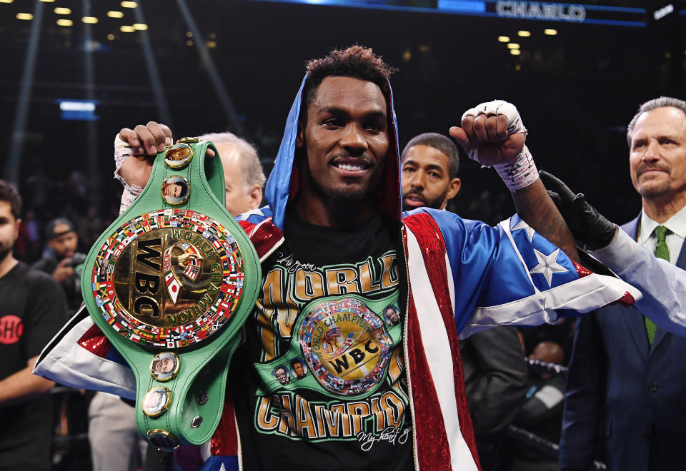 Dec 7, 2019; Brooklyn, NY, USA; Jermall Charlo (blue and red trunks) reacts after knocking out Dennis Hogan of Ireland (white trunk) in the seventh round during a middleweight world championship fight at Barclays Center. Mandatory Credit: Sarah Stier-USA TODAY Sports