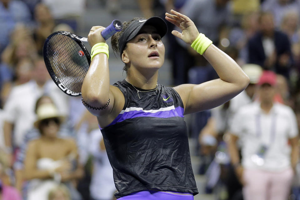 Bianca Andreescu, of Canada, reacts after defeating Elise Mertens, of Belgium, during the quarterfinals of the U.S. Open tennis tournament Wednesday, Sept. 4, 2019, in New York. (AP Photo/Seth Wenig)