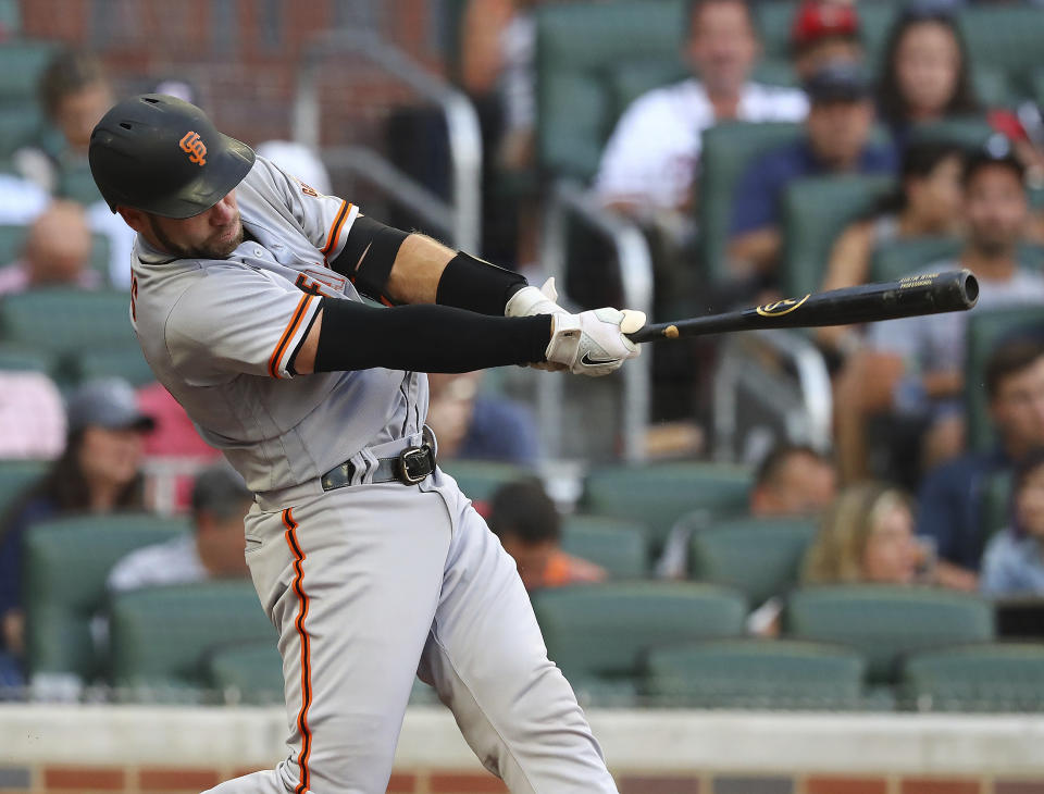 San Francisco Giants catcher Austin Wynns hits a 3-run homer against Braves starting pitcher Spencer Strider to take a 4-0 lead during the second inning of a baseball game on Tuesday, June 21, 2022, in Atlanta. (Curtis Compton Atlanta Journal-Constitution via AP)