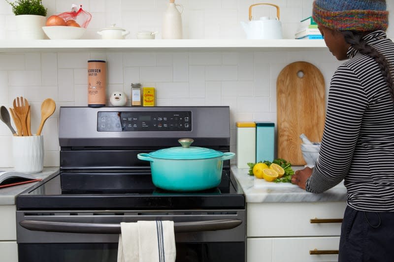 kitchen with blue pot on the stove