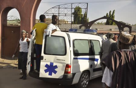 An ambulance enters the premises of the Kano Central Mosque November 28, 2014. REUTERS/Stringer