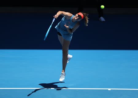 Tennis - Australian Open - Fourth Round - Melbourne Park, Melbourne, Australia, January 20, 2019. Russia's Maria Sharapova in action during the match against Australia's Ashleigh Barty. REUTERS/Lucy Nicholson