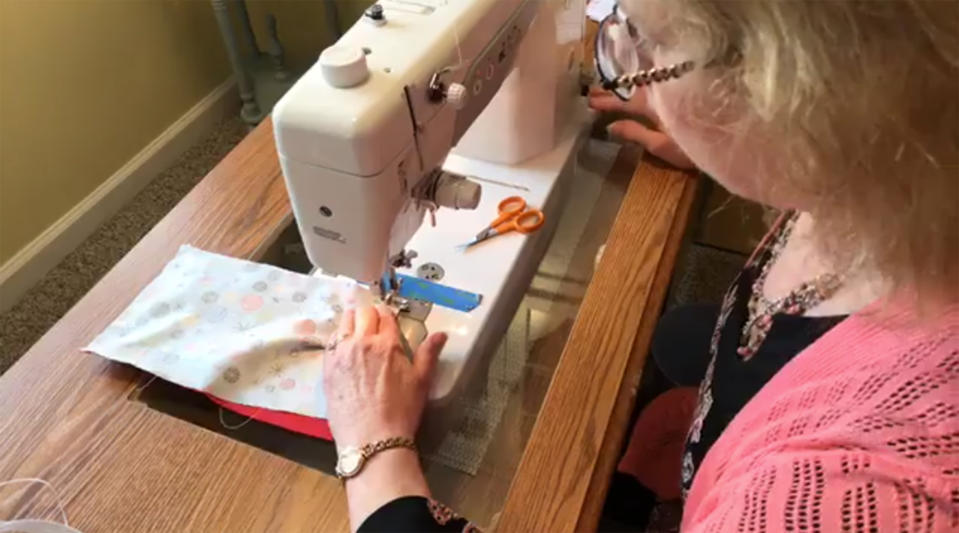 Sheri Yeisley sews a homemade face mask. (Courtesy of Sheri Yeisley)