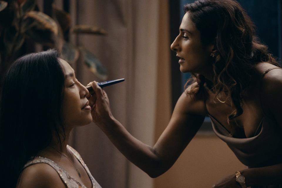 Hilary (Sarayu Blue, right) shares makeup and clothes with Puri (Amelyn Pardenilla) in the fifth episode of "Expats."