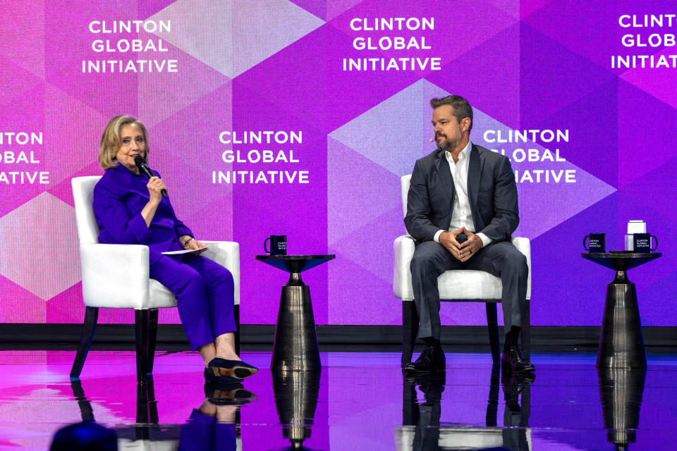 NEW YORK, NEW YORK - SEPTEMBER 23: Actor Matt Damon and Former U.S. Secretary of State Hillary Clinton speak onstage during the Clinton Global Initiative (CGI) on September 23, 2024 in New York City.  Coinciding with the U.N. General Assembly, the Clinton Global Initiative brings together business, government, and civil society leaders to drive progress on humanitarian response efforts to global crises. (Photo by Alex Kent/Getty Images)