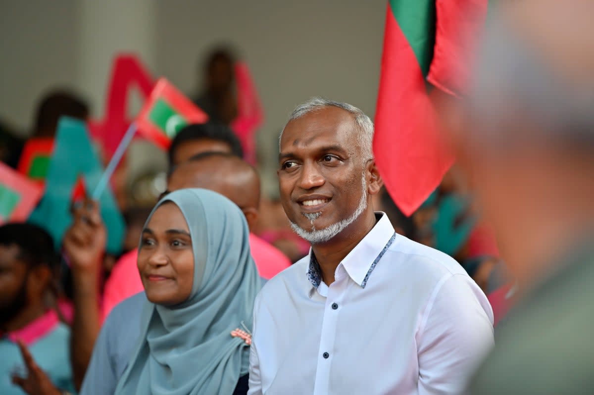 Maldives’ main opposition candidate Mohamed Muiz participates in a rally on 29 September  (AP)