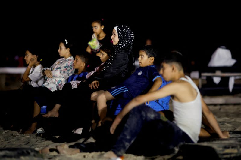 FILE PHOTO: "Cinema and popcorn" a Gaza boy's wish at a rare cinema event