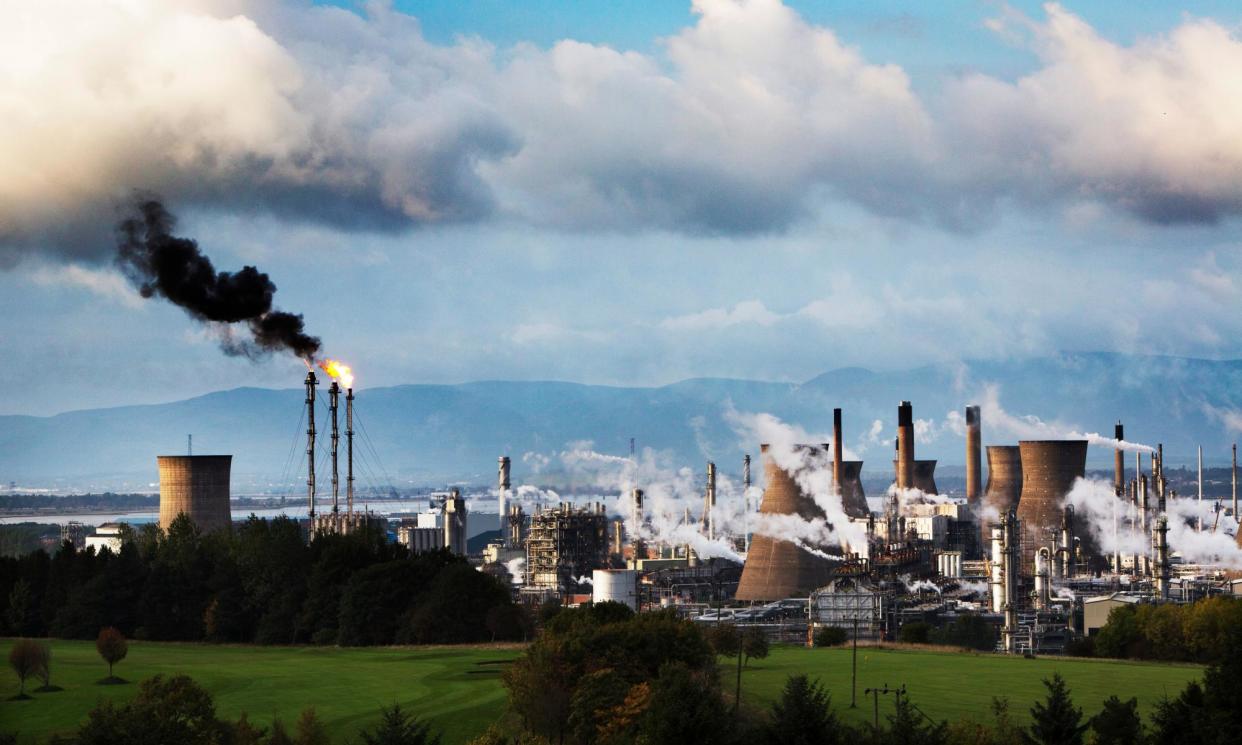 <span>The Grangemouth oil refinery and petrochemical plant. The opposition has called the SNP’s climate climbdown ‘humiliating’.</span><span>Photograph: Murdo Macleod/The Guardian</span>