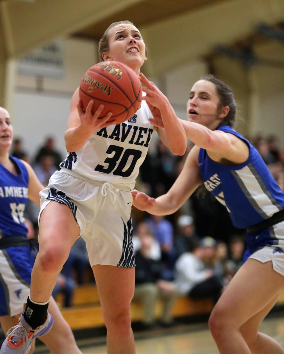 Carsyn Stempa (30) leads Xavier in scoring at 12.4 points per game.