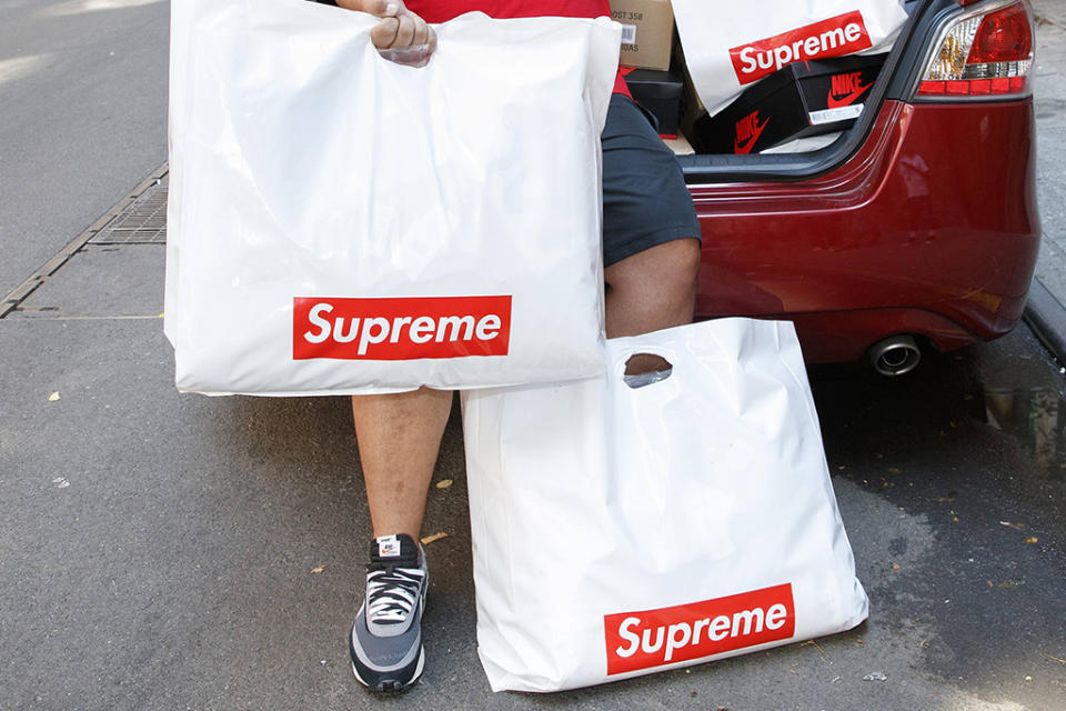 Supreme reseller with several bags from the store. - Credit: MEGA