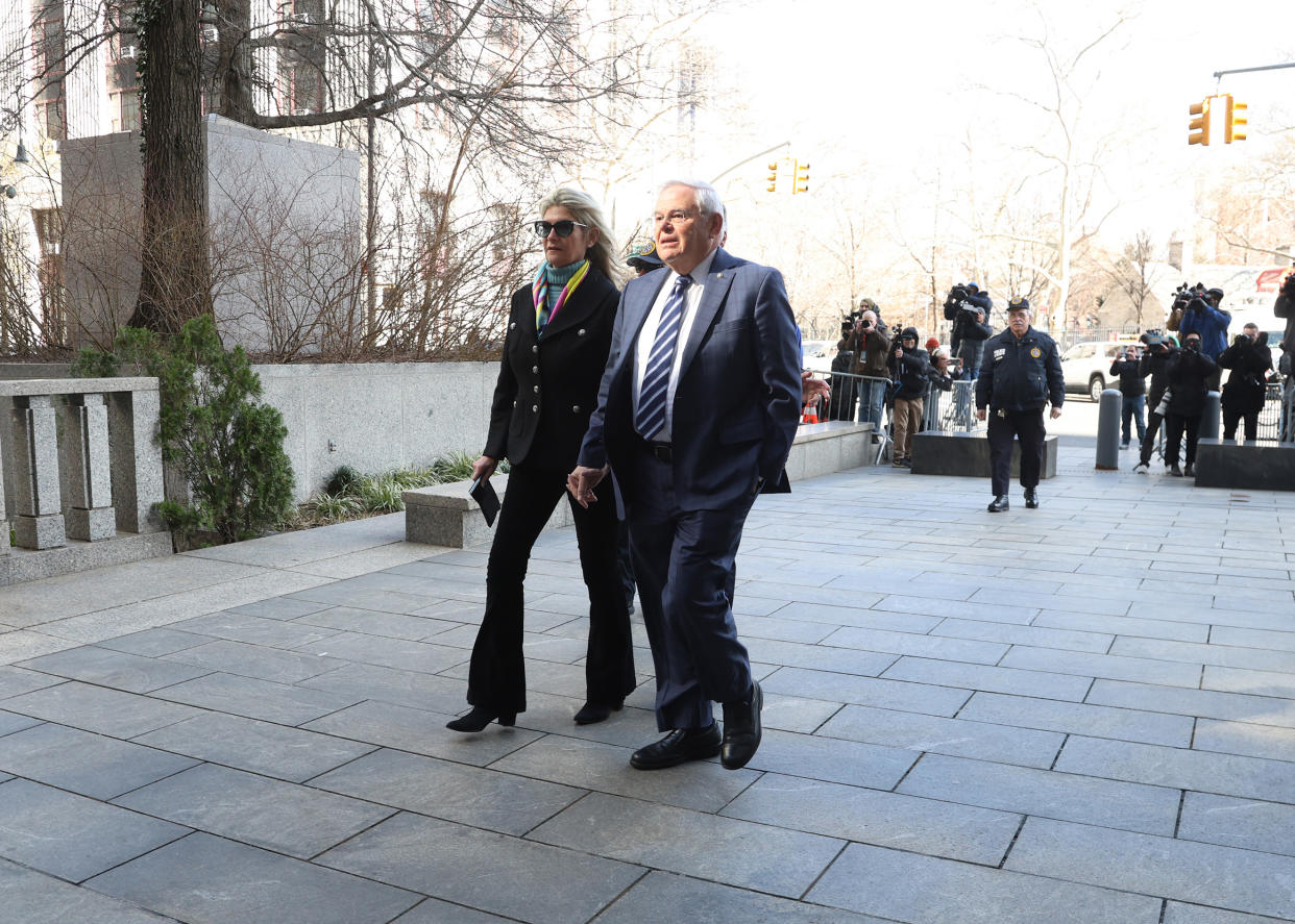 Nadine Menendez and her husband Sen. Bob Menendez (D-N.J.), whose lawyer blamed the senator’s wife and her financial troubles for what prosecutors have described as a bribery scheme involving foreign governments, walk together outside the federal district courthouse in Manhattan, March 11, 2024. (Jefferson Siegel/The New York Times)