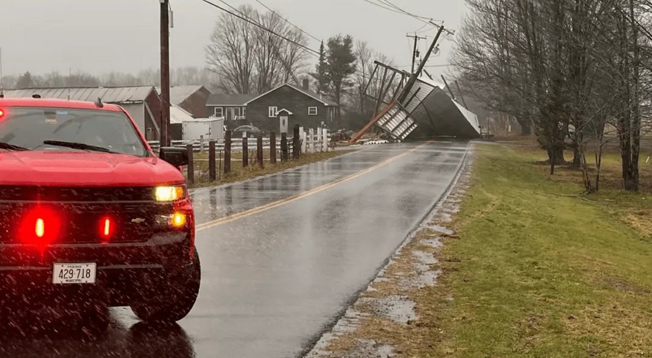 A downed utility pole is blocked off after Maine’s December 2023 storm.