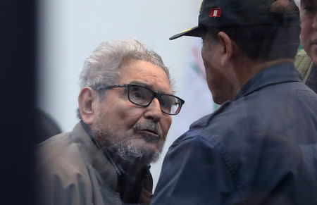 Shining Path founder Abimael Guzman attends a trial during sentence of a 1992 Shining Path car bomb case in Miraflores, at a high security naval prison in Callao, Peru September 11, 2018. REUTERS/Mariana Bazo