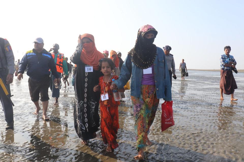 The Rohingya of Myanmar are among several Muslim minorities facing persecution worldwide. Rakhine state, Myanmar, Jan. 13, 2020. <a href="https://www.gettyimages.com/detail/news-photo/rohingya-people-who-were-arrested-at-sea-in-december-walk-news-photo/1193446518?adppopup=true" rel="nofollow noopener" target="_blank" data-ylk="slk:STR/AFP via Getty Images;elm:context_link;itc:0;sec:content-canvas" class="link ">STR/AFP via Getty Images</a>