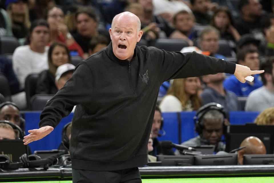 Charlotte Hornets head coach Steve Clifford directs players on the court during the first half of an NBA basketball game against the Orlando Magic, Sunday, Nov. 26, 2023, in Orlando, Fla. (AP Photo/John Raoux)