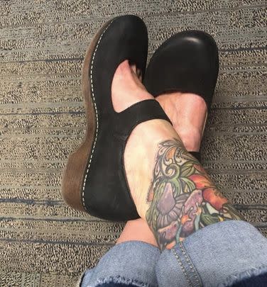 A pair of versatile Dansko clogs that go nicely with a variety of outfits and have a memory foam footbed