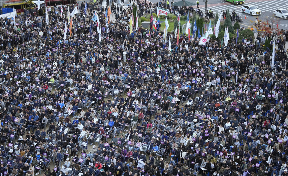 People gather for a rally to mark the first anniversary of the harrowing crowd surge that killed about 160 people in a Seoul alleyway, at the Seoul Plaza in Seoul, South Korea, Sunday, Oct. 29, 2023. (AP Photo/Ahn Young-joon)