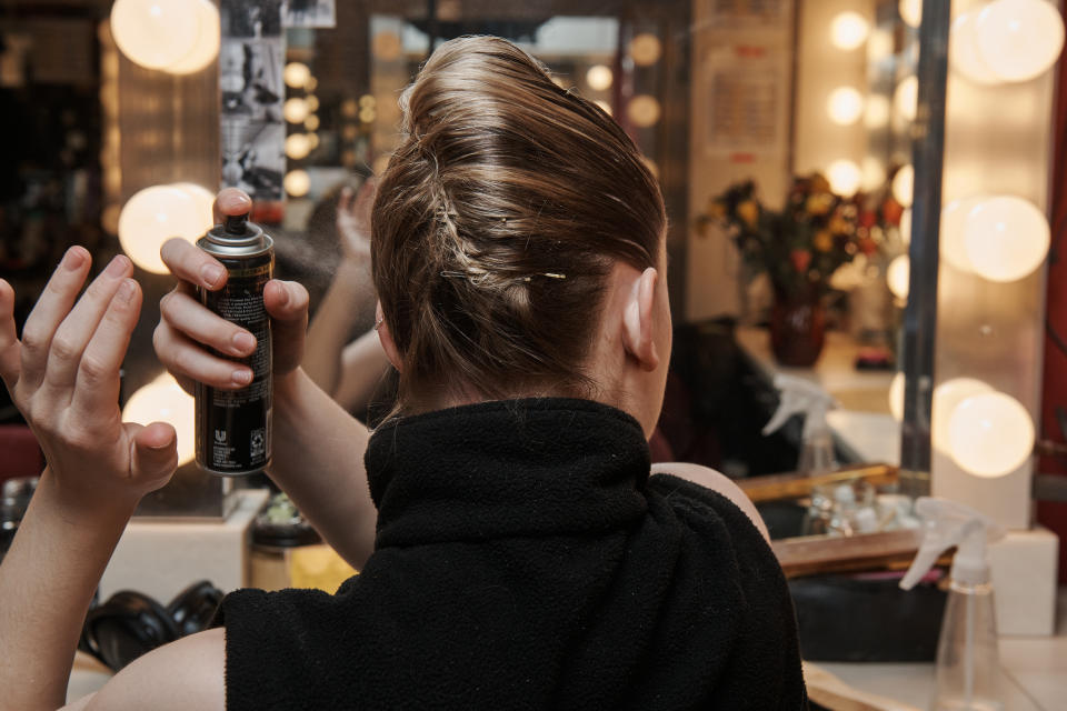 Weinmaster does her hair and makeup. 