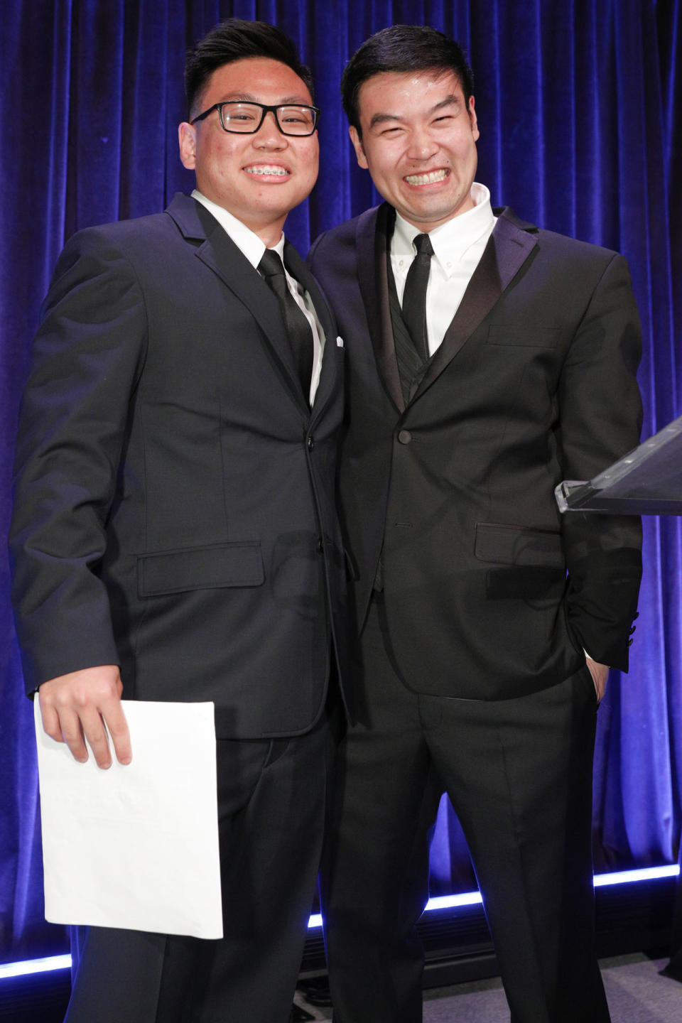 <p>Michael Lee, right, executive director of Apex for Youth, is shown with the event’s student speaker, Sean Park. (Photo: BFA/courtesy of Apex for Youth) </p>