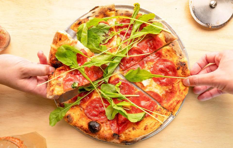 The spicy pepperoni with arugula is one of the specialty pizzas at Harry’s Pizzeria