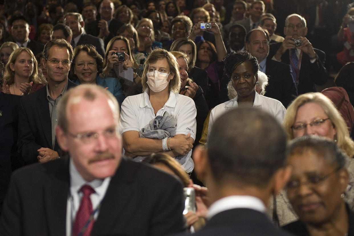 A woman wears a surgical mask in Bethesda, Md. Are masks really an effective way to keep yourself healthy and safe? (Photo: Jim Watson/AFP/Getty Images)