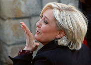 <p>French far-right leader and presidential candidate Marine Le Pen blows a kiss after addressing people in Ennemain, northern France, Thursday, May 4, 2017. (AP Photo/Michel Spingler) </p>