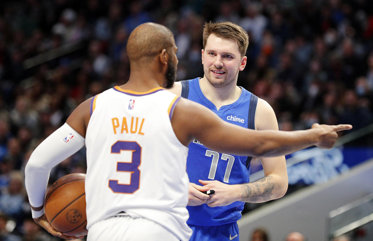 Phoenix Suns point guard Chris Paul and Dallas Mavericks counterpart Luka Doncic are coming at the Western Conference semifinals from different points in their careers. (Richard Rodriguez/Getty Images)